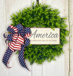 20-22" Diameter Faux Boxwood Wreath on Foam Backing with American Flag Bow and Wooden Sign Insert