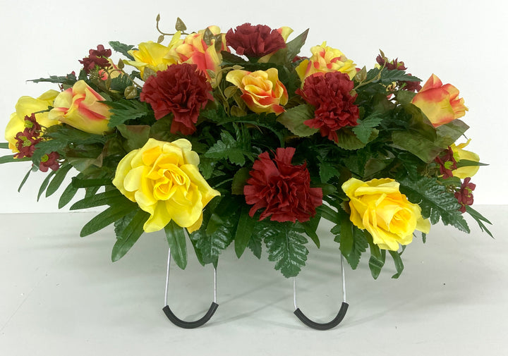 Cemetery Headstone Saddle Arrangement with Yellow roses, Burgundy Peonies, and Swirl Roses