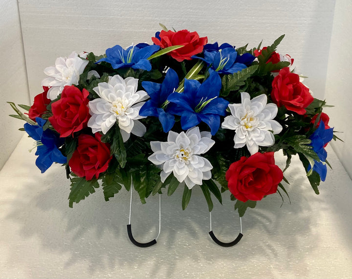Summer Patriotic Cemetery Flowers with Red Roses, Blue Lilies, and White Flowers headstone saddle arrangement